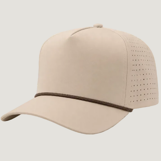 A beige baseball cap with a curved brim, perforated back panels, and a thin brown cord detail around the crown, shown on a light gray background.